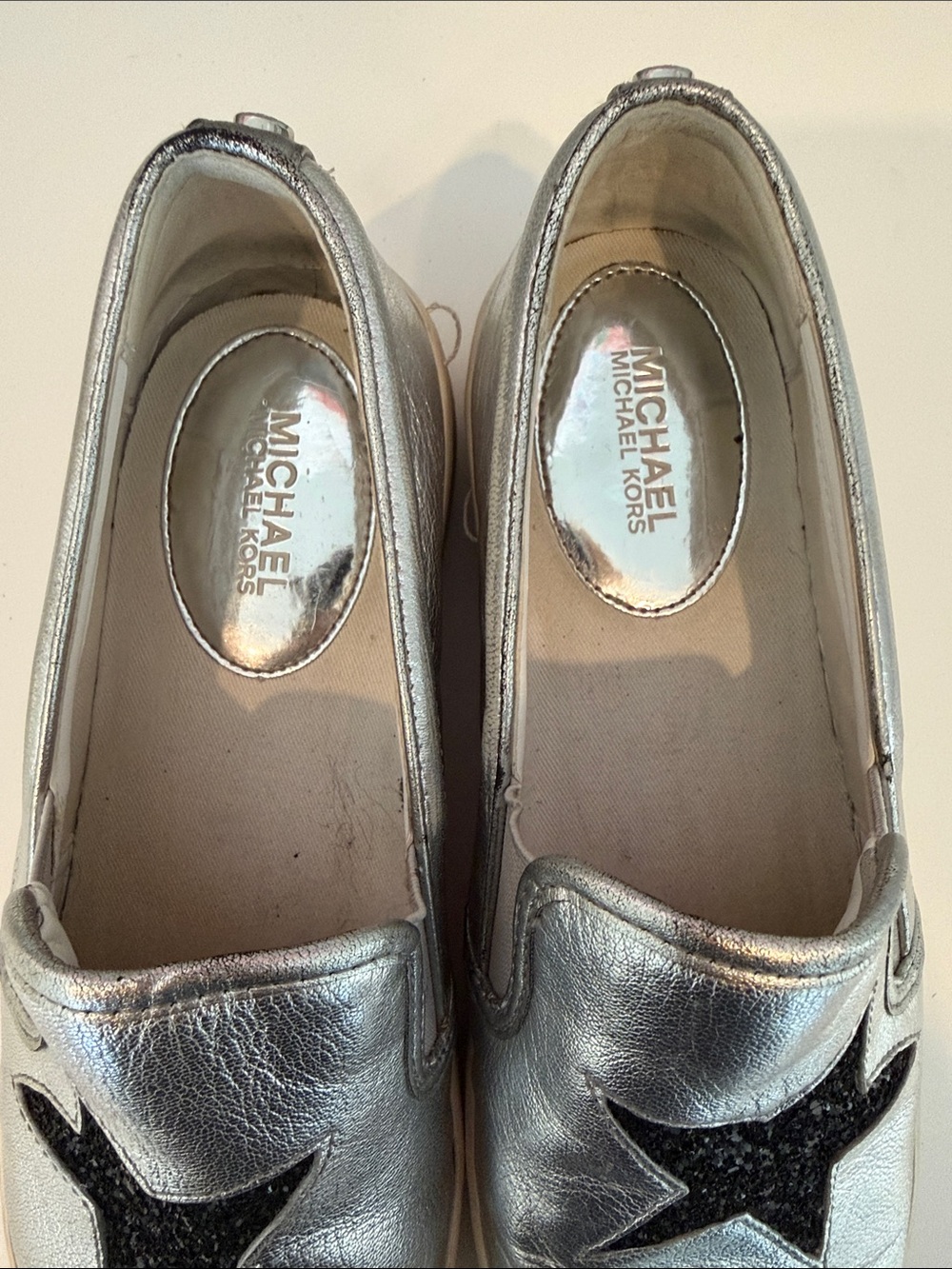 MICHAEL Michael Kors Silver Slip-On Sneakers with Black Star Appliqués - Picture 2 of 8
